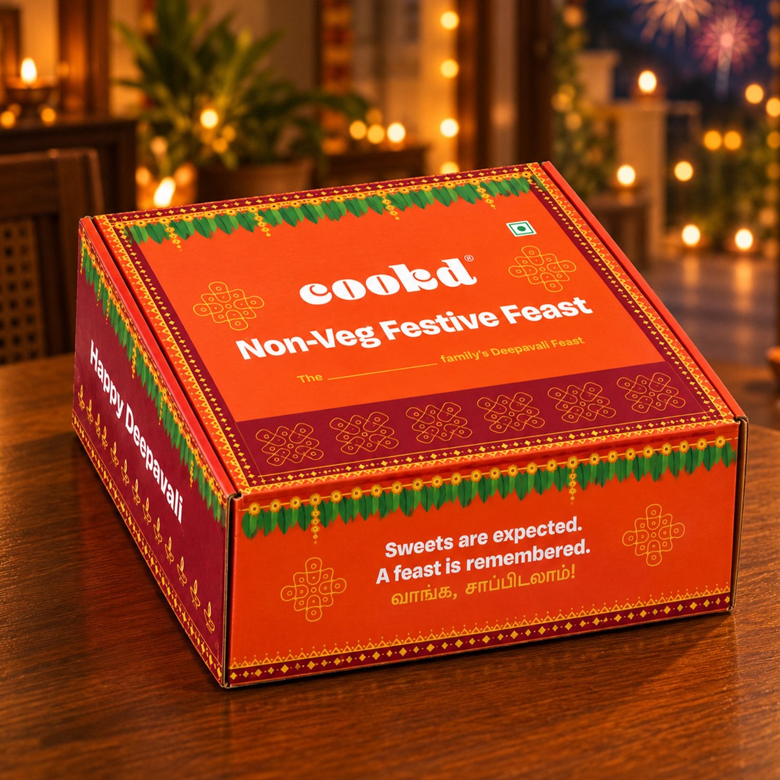 The Cookd Non-Veg Festive Feast box on a Deepavali table